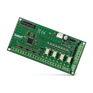 The image shows a green circuit board with multiple connection terminals and electronic components, designed for input and output expansion. It features a compact layout suitable for integration into various electronic systems.