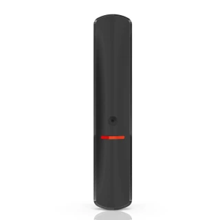 A sleek, black wireless glass break detector with a minimalist design and a small central sensor. The device features a subtle red indicator light near the bottom.