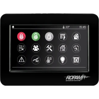 A sleek black touchscreen control panel featuring various icons for home automation functions, including security, lighting, and temperature control. The display shows a digital clock and temperature reading, emphasizing its multifunctional capabilities.