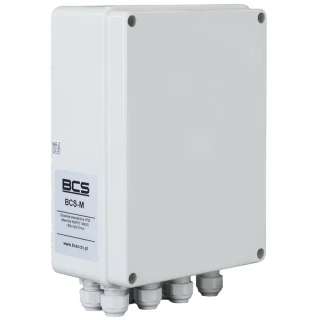 The image shows a rectangular, white external enclosure with a smooth surface and multiple cable entry points at the bottom. It features a label with the brand name "BCS" on the front.