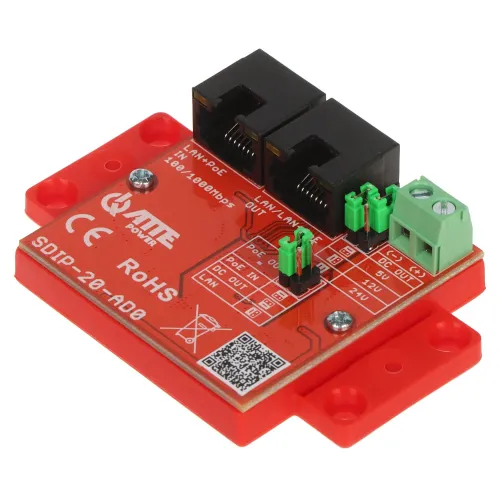 A red electronic module with two black Ethernet ports and multiple green connectors is displayed. The device features a QR code and various technical labels on its surface.