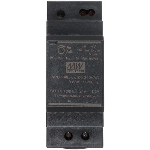 The image shows a Mean Well power supply unit with a black rectangular casing, featuring input specifications of 100-240VAC and output specifications of 24VDC at 1.5A. The unit includes terminal torque details and adjustment options for voltage.