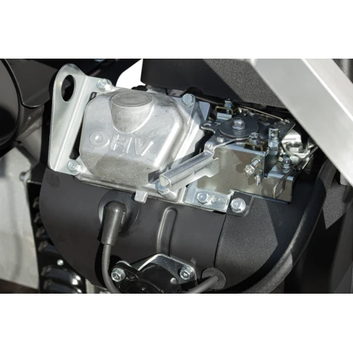 Close-up view of a generator engine showcasing its metallic components and robust construction. The image highlights the OHV (Overhead Valve) design, emphasizing durability and efficiency.