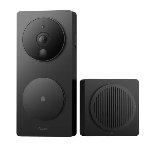 A sleek black smart video doorbell with a circular camera lens and a button featuring a bell icon, accompanied by a matching square chime unit with a textured front. The modern design is minimalist, suitable for enhancing home security with style.