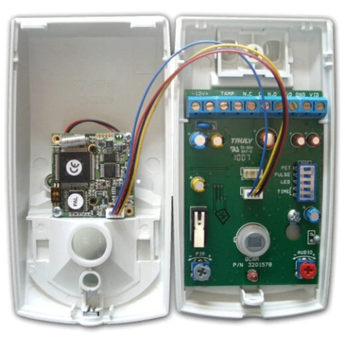 The image shows an open motion sensor with a 2MP camera, revealing its internal electronic components and wiring. The device features a circuit board with various connectors and settings for customization.