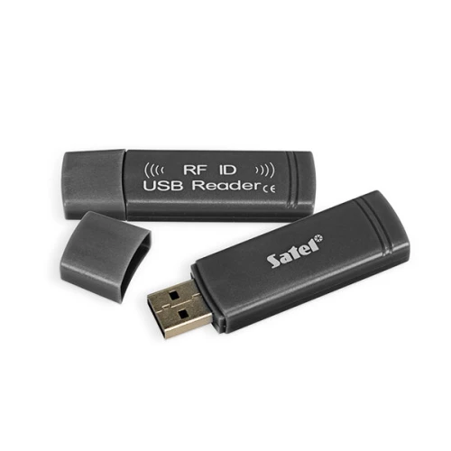 A black USB RFID card reader with a removable cap, featuring the "RF ID USB Reader" label on its surface. The compact design allows for easy portability and convenient use with various devices.