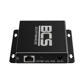 A black HDMI extender receiver with a sleek rectangular design features ports for UTP/RST, STA, PWR, and DC 5V connections. The device is branded with "BCS" on the top surface and includes mounting brackets on the sides.