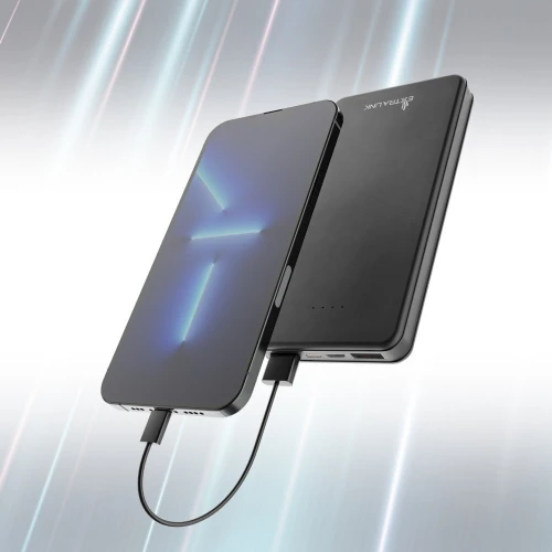 A sleek black power bank with a minimalist design is shown alongside a smartphone connected via a charging cable. The power bank features LED indicators and the Extralink logo on its surface.