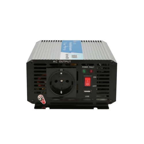 The image shows a black power inverter with a European AC outlet, USB port, and power switch on the front panel. It features a metal casing with a blue label on top, indicating its specifications and brand.