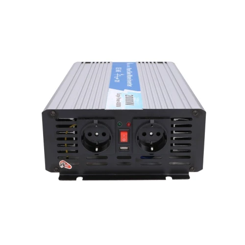 The image shows a power inverter with a sleek, rectangular design featuring dual European-style sockets on the front panel. It has a metallic casing with a blue label on top, and includes a power switch and indicator lights for operational status.