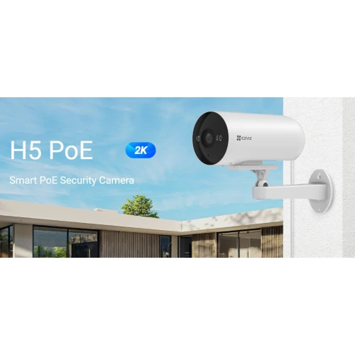 Outdoor wall-mounted Ezviz H5 PoE security camera with a sleek white cylindrical design and 2K resolution. The camera is positioned to monitor a modern home, emphasizing its smart surveillance capabilities.