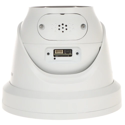 A white security camera base featuring a memory card slot and a reset button on the back. The design includes a speaker grille and a sleek, modern finish.