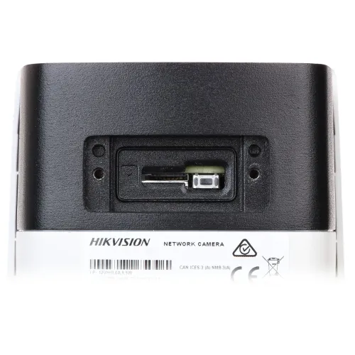 The image shows the back of a Hikvision network camera featuring a memory card slot. The slot is designed for easy access and secure installation of a memory card.