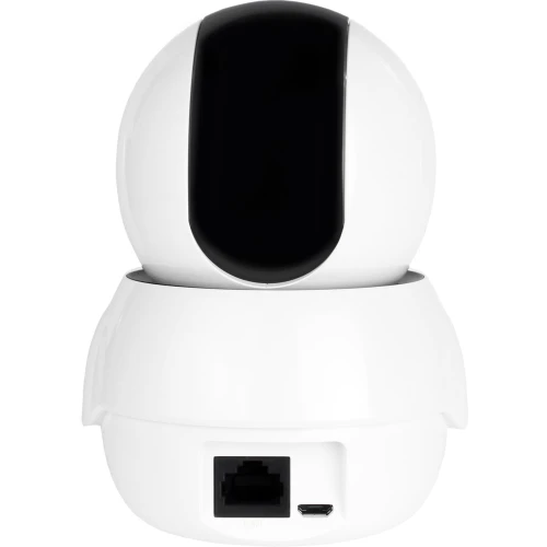 A sleek, white network camera with a black lens cover, featuring a compact, rounded design. The back of the camera includes an Ethernet port and a micro USB port for connectivity.