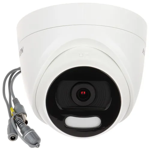 A white dome security camera with a black lens and multiple connection cables is shown. The camera is designed for high-definition surveillance and features ColorVu technology for enhanced color imaging.