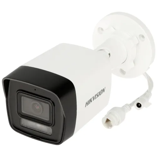 A white Hikvision IP camera with a sleek, rectangular design features a prominent lens and multiple connection cables. The camera is designed for outdoor surveillance, offering high-resolution imaging and enhanced night vision capabilities.