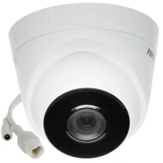 A white Hikvision dome-shaped IP camera with a black lens and attached cables is shown. The camera is designed for security surveillance, featuring a sleek and modern design.