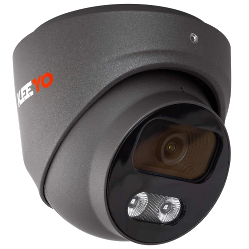 A sleek, gray dome security camera with a modern design features a prominent lens and dual infrared LEDs for enhanced night vision. The camera's compact and durable housing is suitable for both indoor and outdoor surveillance.