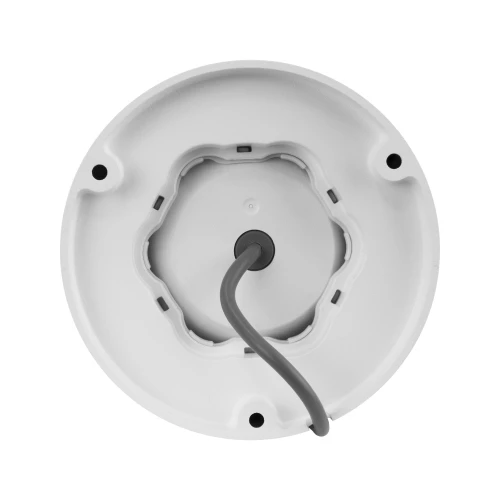 The image shows the back view of a white dome-shaped security camera with a central cable for connectivity. The camera features a circular design with multiple mounting holes for easy installation.