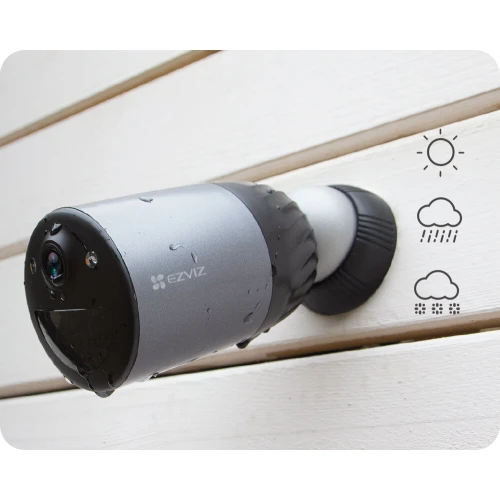 A sleek, weatherproof WiFi security camera with a modern design is mounted on an exterior wall, featuring a durable casing suitable for various weather conditions. The camera is equipped with a lens and sensors, ideal for outdoor surveillance.