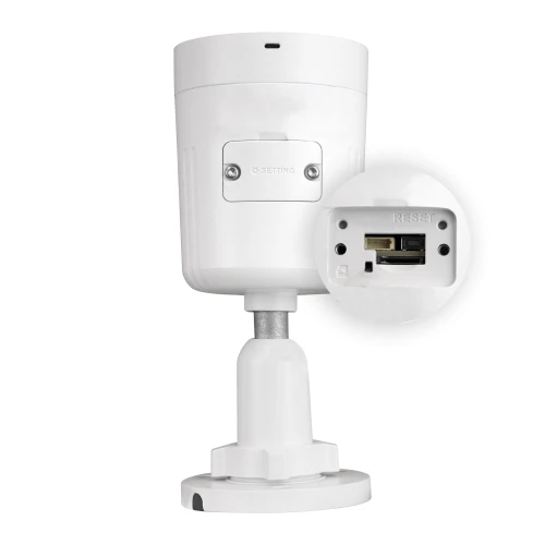 A white bullet security camera with a sturdy mounting base and visible connection ports. The camera features a compact design with a focus on durability and ease of installation.
