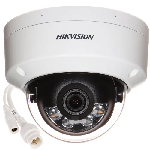 A white, dome-shaped, vandal-resistant IP camera with a black lens and multiple LED lights is shown, featuring a durable design suitable for outdoor surveillance. The camera includes a network cable and a power connector, emphasizing its hybrid light technology for enhanced security.