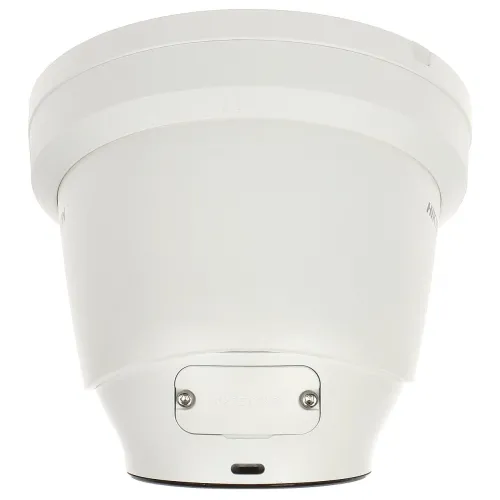 A white, dome-shaped security camera is shown removed from its mounting bracket, highlighting its sleek design and durable construction. The camera features a smooth, rounded exterior with visible screws for easy installation.