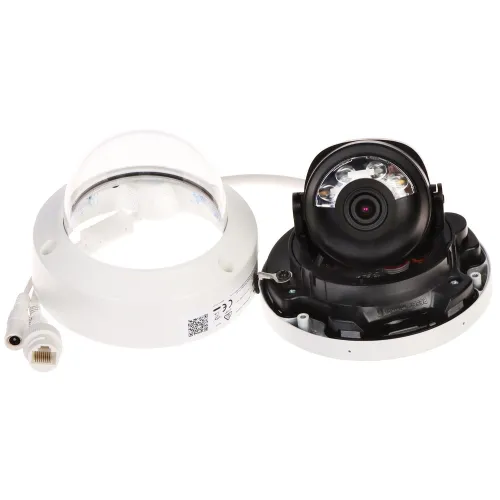A disassembled dome security camera is shown with its components, including the lens and wiring, separated from the mounting ring. The image highlights the camera's internal structure and connectivity features.