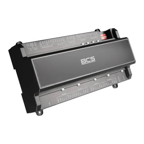 A sleek, rectangular access control device with a black and gray finish, featuring multiple connection ports and labeled indicators. The device prominently displays the BCS logo on its front panel.