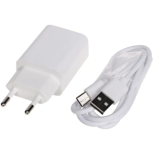 A white USB wall charger with a European plug is shown alongside a matching white USB to micro USB cable. The compact design makes it ideal for travel and everyday use.