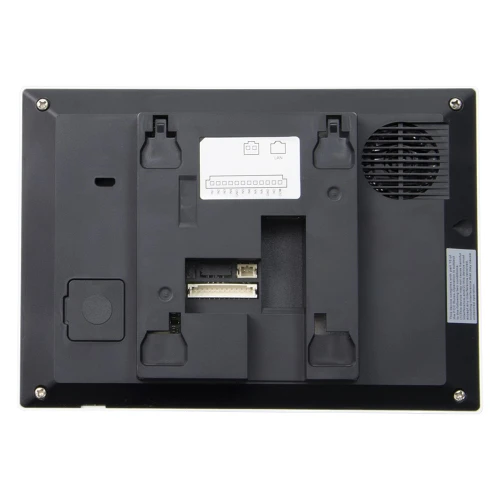 The image shows the back view of a black IP video intercom monitor with multiple connection ports and mounting brackets. The design includes a ventilation grille and a label indicating connection points.