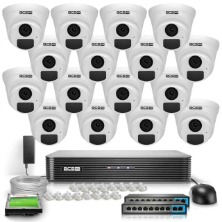 The image shows a comprehensive security system package featuring multiple white dome cameras, a central recording unit, and various accessories including cables and connectors. The setup is designed for full HD IP monitoring, suitable for extensive surveillance needs.