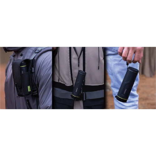 A compact thermal monocular is shown in three different scenarios: attached to a backpack, held in hand, and secured on a belt. The device features a sleek black design with a textured grip and visible control buttons.
