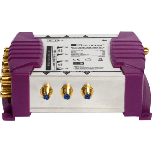 The image shows a multiswitch device with a sturdy metal casing and purple plastic accents on the sides. It features multiple coaxial connectors for satellite and terrestrial signals, designed for efficient signal distribution.