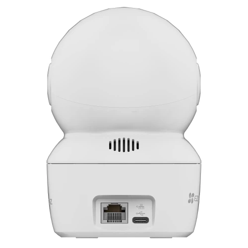 A white, dome-shaped WiFi security camera with a dual-lens design is shown from the back, featuring an Ethernet port and a USB-C connection. The camera has a sleek, modern appearance with ventilation slots for cooling.