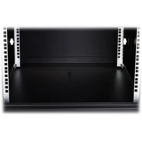 The image shows a sleek black cable grommet installed in a floor panel, designed for efficient cable management. It features a minimalist design with a central opening for organizing and concealing cables.