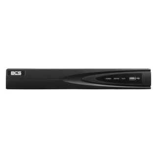 A sleek black network video recorder with a minimalist design features a USB port and indicator lights on the front panel. The BCS logo is prominently displayed on the left side of the device.