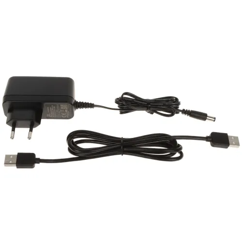 A black power adapter with a European plug is shown alongside two USB cables, one with a standard USB connector and the other with a DC barrel connector. The cables are neatly coiled, highlighting their length and flexibility.