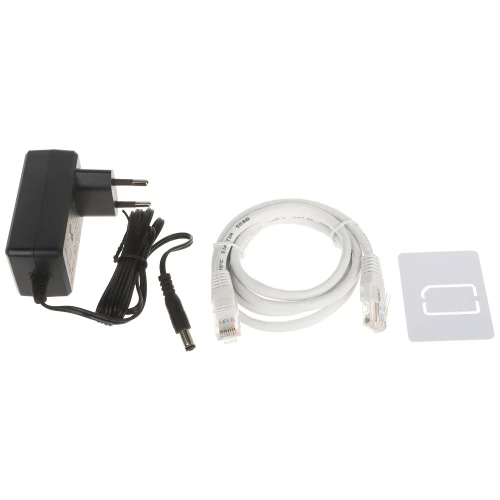 The image shows a power adapter with a European plug, a white Ethernet cable, and a white plastic card with a SIM card slot. These components are likely part of a networking or telecommunications setup.