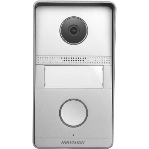 The image shows a sleek, silver Hikvision video doorbell with a camera lens at the top and a large button at the bottom. The device features a minimalist design with a rectangular shape and a small speaker grille.