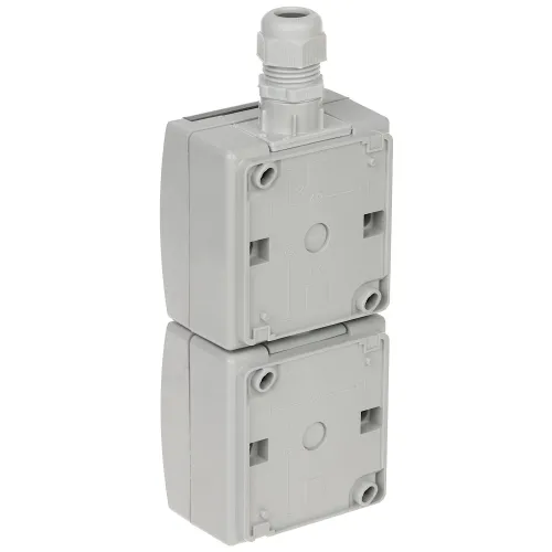 The image shows a gray, dual electrical junction box with a cable gland on top for secure wiring connections. The box features multiple mounting points and is designed for easy installation in various electrical setups.