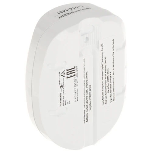 The image shows the back view of a white Hikvision wall mount bracket, designed for secure camera installation. The bracket features multiple mounting holes and detailed product information printed on its surface.