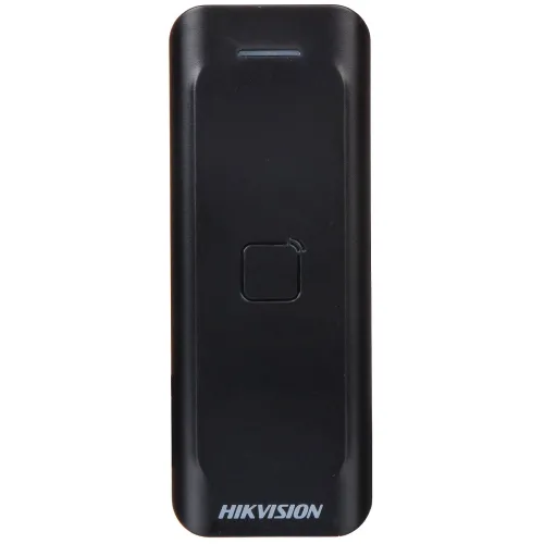 A sleek black access control reader with a minimalist design, featuring a central touchpoint and subtle branding at the bottom. The device is designed for secure entry systems, offering a modern and unobtrusive appearance.
