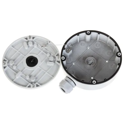 The image shows a round, white metal junction box with a removable lid, designed for secure electrical connections. The interior features multiple mounting points and a cable gland for organized wiring management.