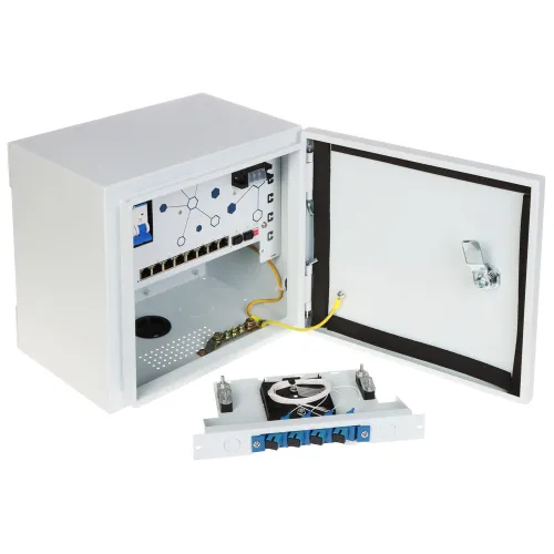 The image shows a white metal enclosure with an open door, revealing a network panel with multiple ports and a circuit diagram on the inside. Below the enclosure, there is a removable panel with fiber optic connectors and cables.