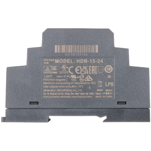 The image shows a gray Mean Well HDR-15-24 power supply unit with detailed specifications and safety certifications printed on its side. The unit is designed for DIN rail mounting and features a compact, industrial design suitable for various electrical applications.