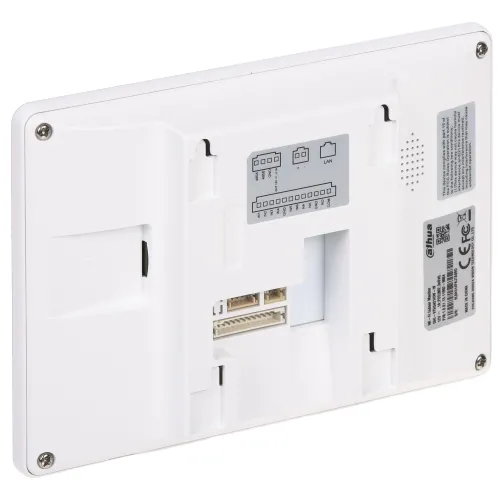 The image shows the back view of a white electronic device, featuring multiple ports and connectors for installation. The device has a sleek rectangular design with visible screws at the corners and a label with technical specifications.