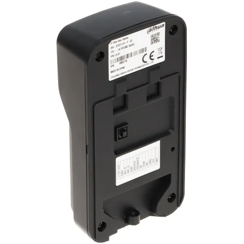 The image shows the back view of a black Dahua video door station, featuring mounting slots and a label with technical specifications. The device is designed for secure installation and connectivity in home security systems.