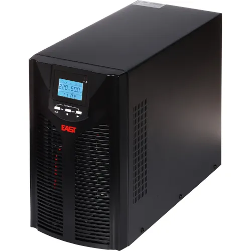 The image shows a black UPS unit with a digital LCD display on the front panel, displaying voltage and battery information. The unit features ventilation grilles on the sides and a sleek, modern design.