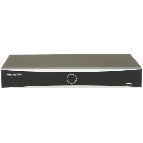 A sleek, black Hikvision network video recorder with a minimalist design and a USB port on the front panel. The device features a subtle circular logo in the center, emphasizing its modern aesthetic.